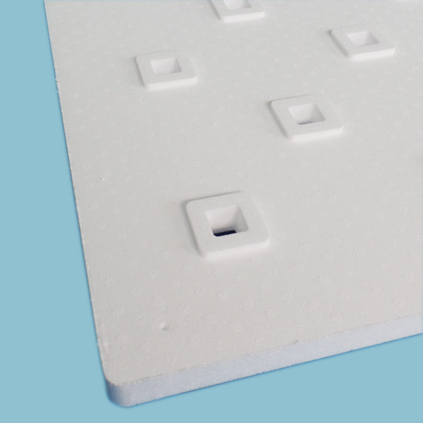 A white piece of foam used in hydroponic Deep Water Culture systems, specifically for Aquaponics For Life lettuce raft boards.