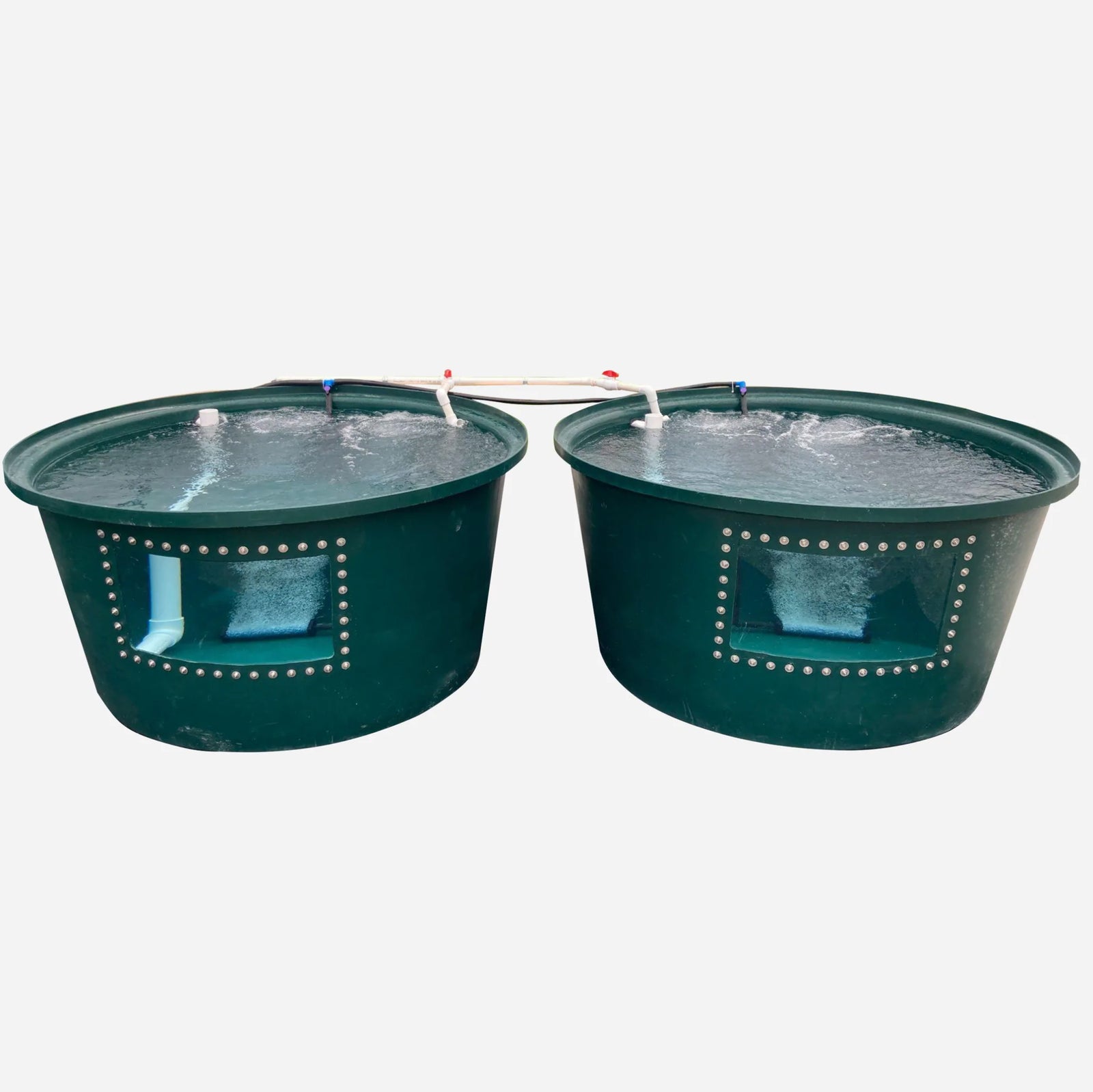 The TAS Flourish Fish Farm 600 features two large green circular tanks with rectangular cutouts, connected by pipes for water circulation—perfect for small-scale or recirculating aquaculture setups. Custom quote required.