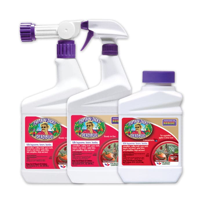 Three bottles of TAS Captain Jack’s Dead Bug Brew Spinosad insecticide, with a purple bottle and a purple sprayer.