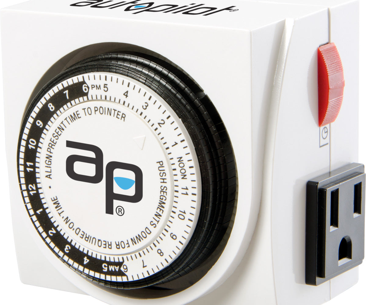A white TAS Dual Outlet Analog Timer with the word &quot;ap&quot; on it.