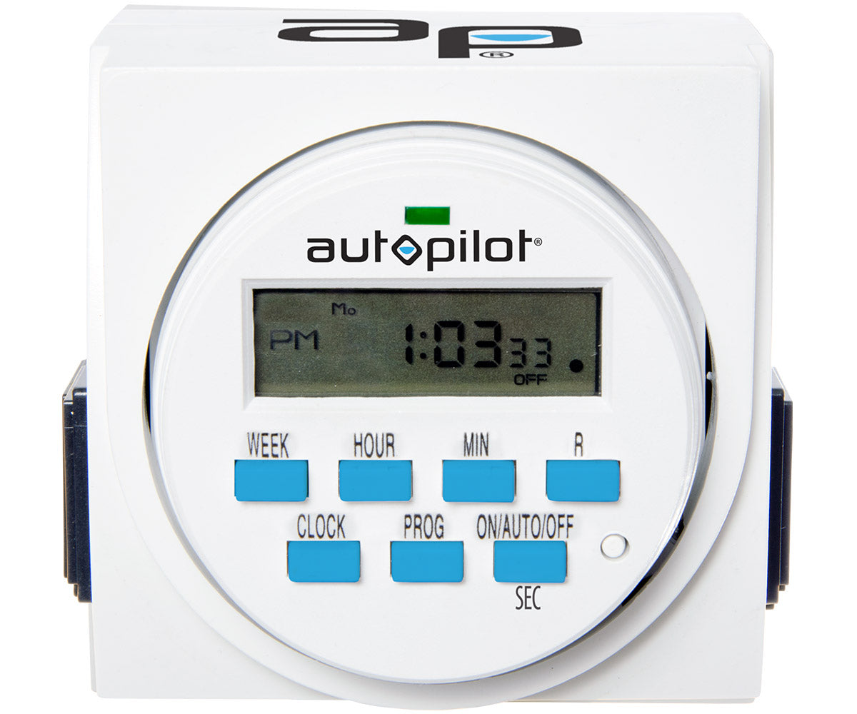 A white clock with the words &quot;autopilot&quot; and &quot;digital timer&quot; on it.
