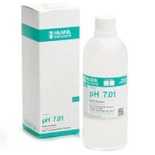 A bottle of Hanna pH 7.01 Calibration Buffer Solution by TAS in front of a box.